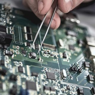 A circuit board being worked on