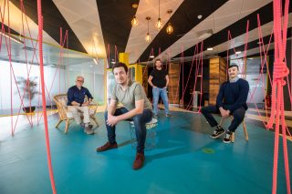 Ross O'Dwyer with staff in Locker Offices
