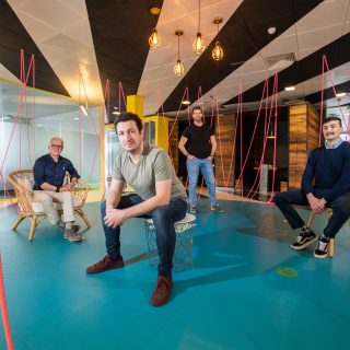 Ross O'Dwyer with staff in Locker Offices