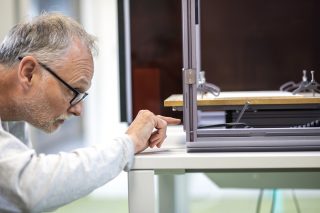 Man working in FabLab Manorhamilton