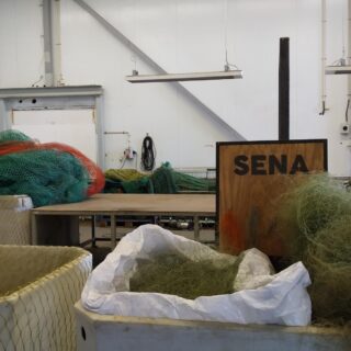Boxes of used fishing nets.