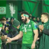 Paul Boyle of Connacht Rugby in team jersey surrounded by well wishers
